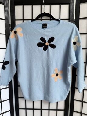 AVEDA Light Blue Floral Patch Pullover